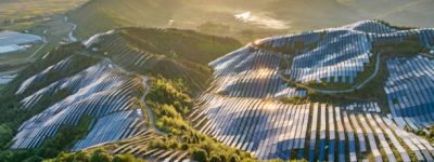 aerial photography of photovoltaic panels on the mountain